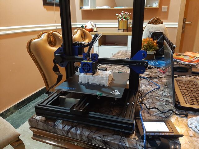 Front view of the printer mid-print at home
